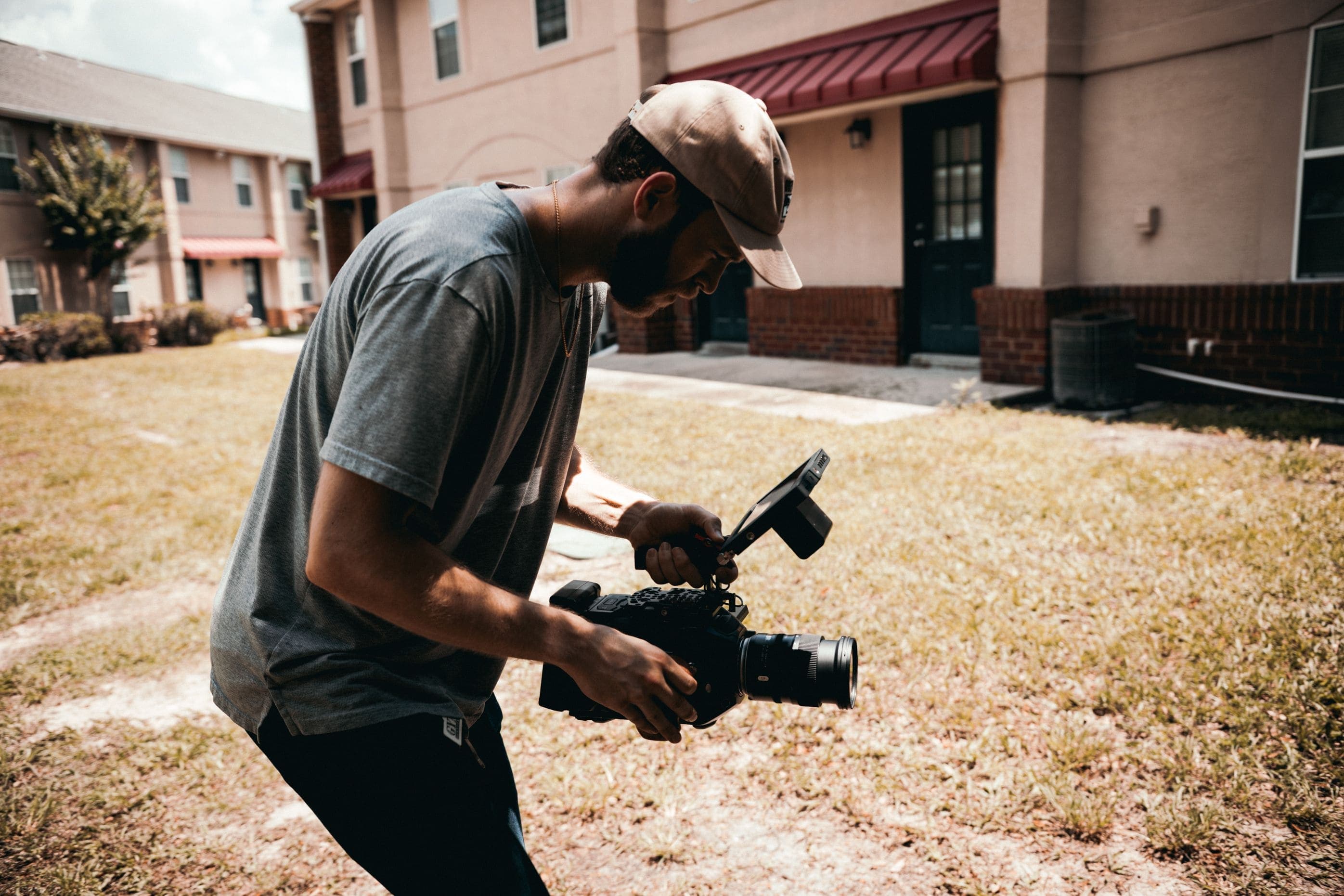 Video editor reviewing footage at a workstation